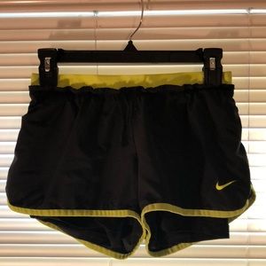Black with neon green Nike shorts with spandex
